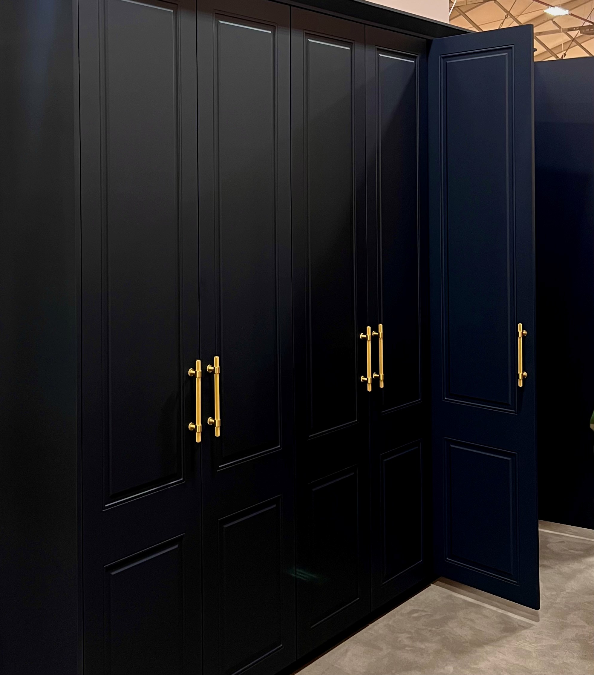 A 6 door indigo coloured wardrobe with brass handles from this Simple Wardrobes NI range.